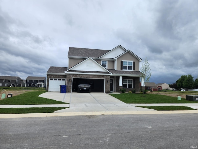 craftsman-style house with brick siding, a front lawn, a garage, and concrete driveway