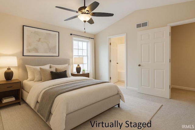 5922 N Ajuga Ct, Ellettsville, IN 47429 - bedroom featuring connected bathroom, visible vents, light carpet, baseboards, and lofted ceiling