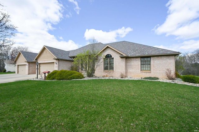 ranch-style home with a garage, concrete driveway, a front lawn, and brick siding