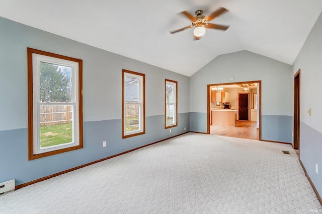 unfurnished room with light carpet, ceiling fan, baseboards, and lofted ceiling