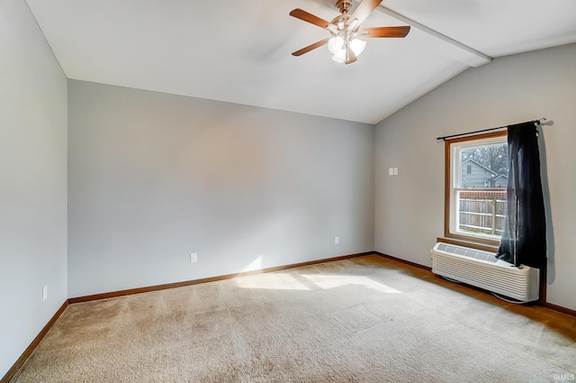 carpeted spare room featuring vaulted ceiling with beams, baseboards, a ceiling fan, and an AC wall unit