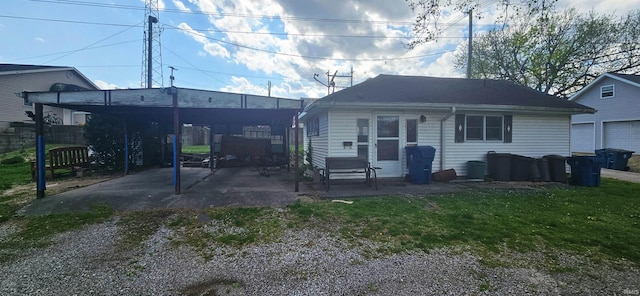 126 E 4th St, Mount Carmel, IL 62863 - rear view of property featuring a patio area