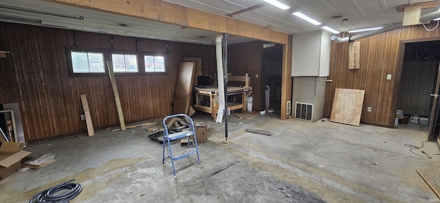 126 E 4th St, Mount Carmel, IL 62863 - below grade area featuring wooden walls and visible vents