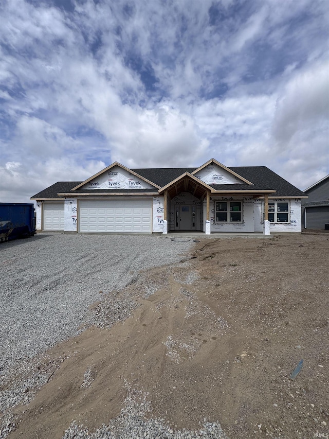 908 Marshall Way N, Manchester, IN 46962 - unfinished property featuring a garage, a porch, and driveway