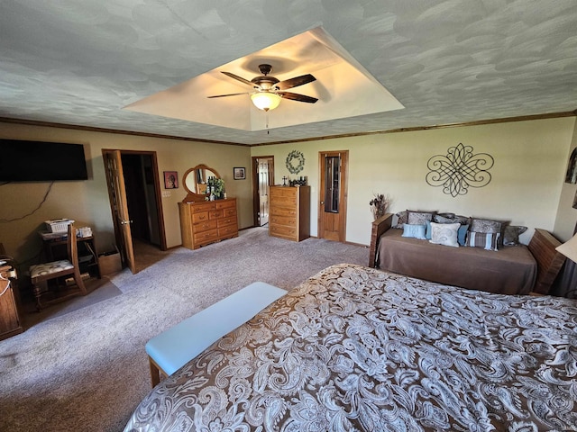 501 Monticello Dr, Vincennes, IN 47591 - bedroom with ornamental molding, a tray ceiling, and carpet