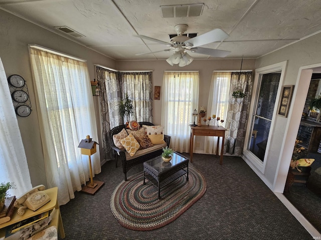 501 Monticello Dr, Vincennes, IN 47591 - sitting room with visible vents, ceiling fan, and carpet flooring