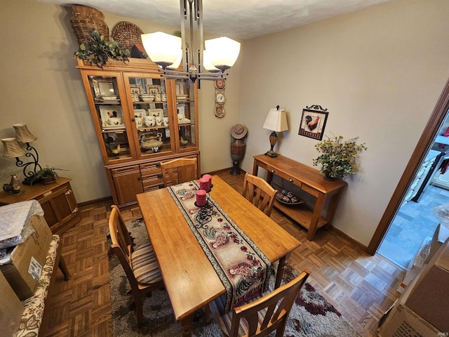 501 Monticello Dr, Vincennes, IN 47591 - dining room with a notable chandelier and baseboards
