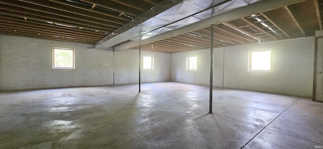 402 Easy St, Mount Carmel, IL 62863 - basement featuring plenty of natural light and brick wall