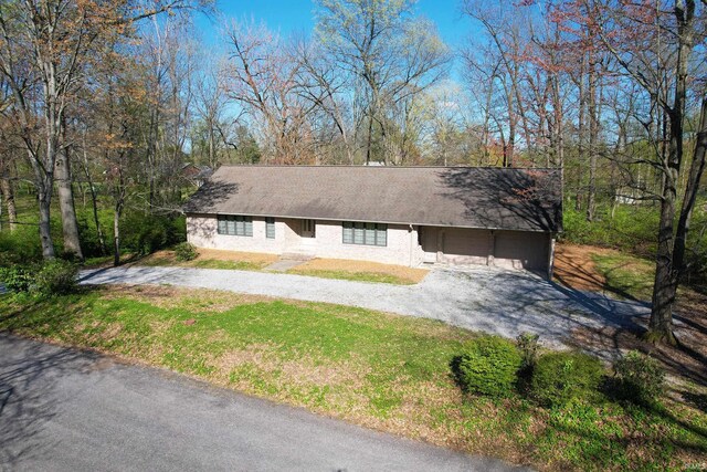 402 Easy St, Mount Carmel, IL 62863 - view of front facade featuring a front yard, stucco siding, and dirt driveway
