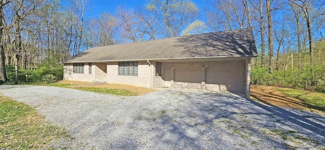 402 Easy St, Mount Carmel, IL 62863 - ranch-style house with a garage and driveway