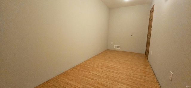 402 Easy St, Mount Carmel, IL 62863 - spare room with light wood-type flooring and visible vents