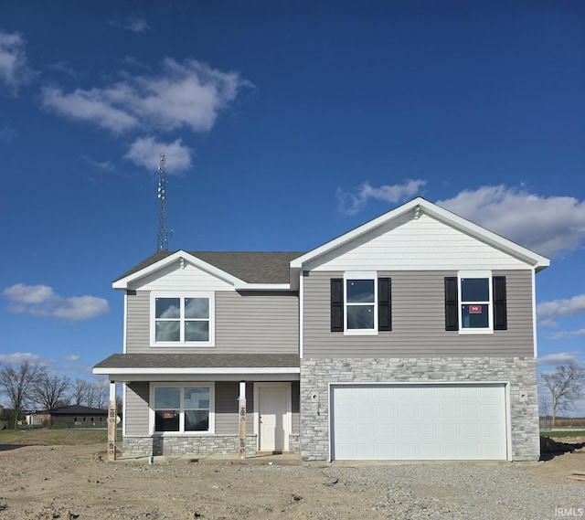view of front of house with a garage, roof with shingles, driveway, and stone siding