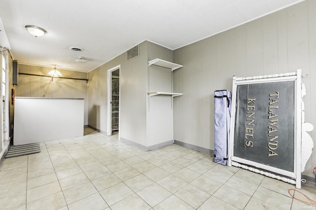 411 S County Road 550 E, Selma, IN 47383 - spare room with light tile patterned floors, baseboards, and visible vents
