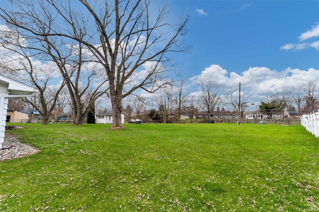 view of yard featuring fence