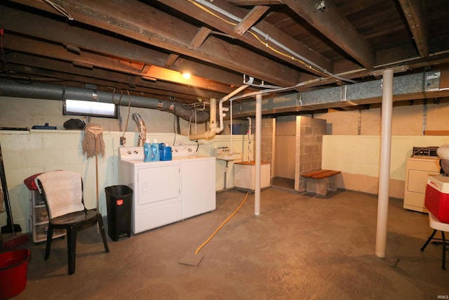 unfinished basement with washer and dryer