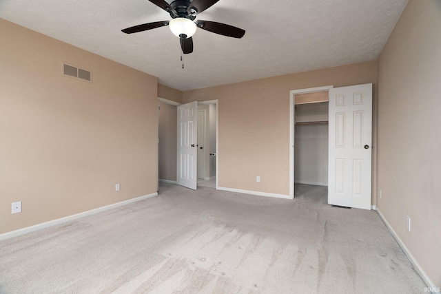 526 Cambridge Dr, Kokomo, IN 46902 - unfurnished bedroom with visible vents, baseboards, and a textured ceiling