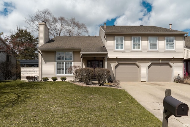 526 Cambridge Dr, Kokomo, IN 46902 - split level home with a garage, a chimney, concrete driveway, a front lawn, and roof with shingles