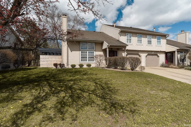 526 Cambridge Dr, Kokomo, IN 46902 - view of front of property featuring a front yard, an attached garage, driveway, and a chimney