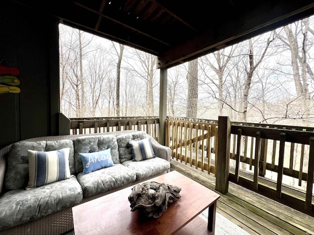 wooden terrace featuring outdoor lounge area