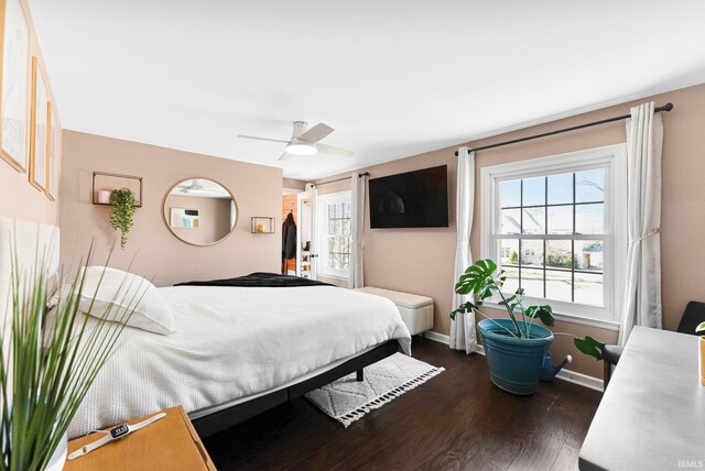 4707 Old Mill Rd, Fort Wayne, IN 46807 - bedroom featuring dark wood-type flooring, baseboards, and a ceiling fan