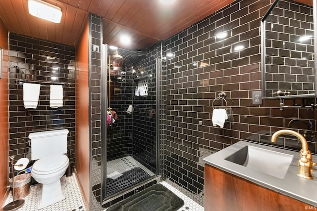 4707 Old Mill Rd, Fort Wayne, IN 46807 - full bathroom featuring toilet, tile patterned floors, a stall shower, and tile walls