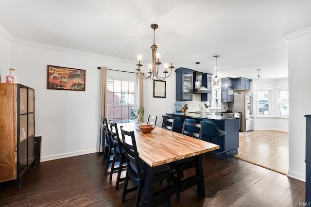 4707 Old Mill Rd, Fort Wayne, IN 46807 - dining area with a chandelier, dark wood-style floors, baseboards, and ornamental molding