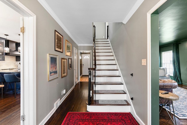 4707 Old Mill Rd, Fort Wayne, IN 46807 - stairway featuring ornamental molding, visible vents, baseboards, and wood finished floors