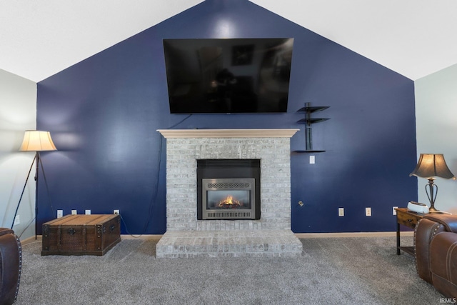 carpeted living room with a fireplace, vaulted ceiling, and baseboards