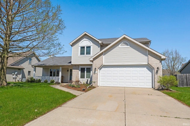 traditional-style home with brick siding, a porch, a front lawn, and driveway
