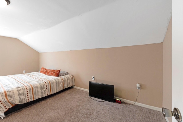 604 Short St, Decatur, IN 46733 - bedroom with vaulted ceiling, carpet flooring, and baseboards