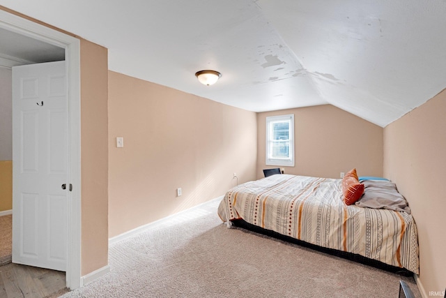 604 Short St, Decatur, IN 46733 - carpeted bedroom featuring lofted ceiling and baseboards