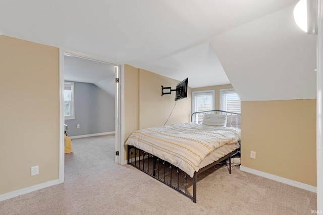604 Short St, Decatur, IN 46733 - bedroom with baseboards, vaulted ceiling, and carpet