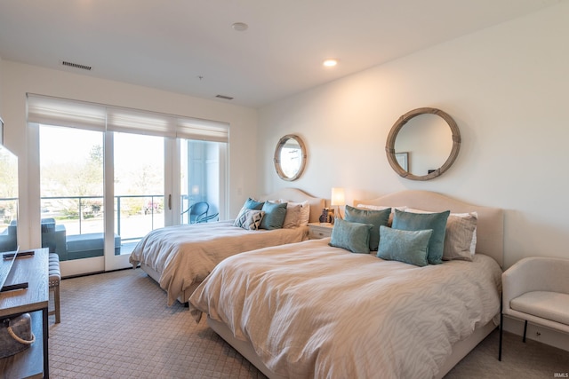 304 W Kirkwood Ave Unit 305, Bloomington, IN 47404 - bedroom with recessed lighting, carpet, visible vents, and access to exterior