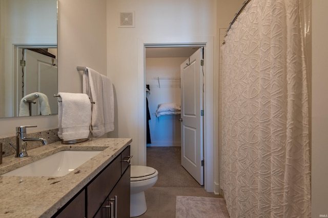 304 W Kirkwood Ave Unit 305, Bloomington, IN 47404 - bathroom with visible vents, a shower with curtain, toilet, vanity, and tile patterned floors