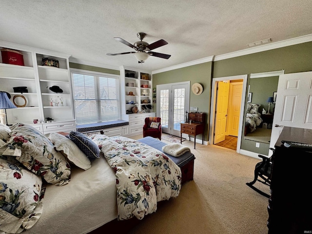bedroom featuring french doors, visible vents, a textured ceiling, and crown molding