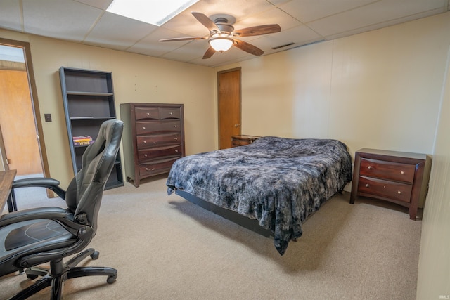 5793 E Pierce Rd, Monticello, IN 47960 - bedroom featuring visible vents, ceiling fan, a drop ceiling, and light colored carpet