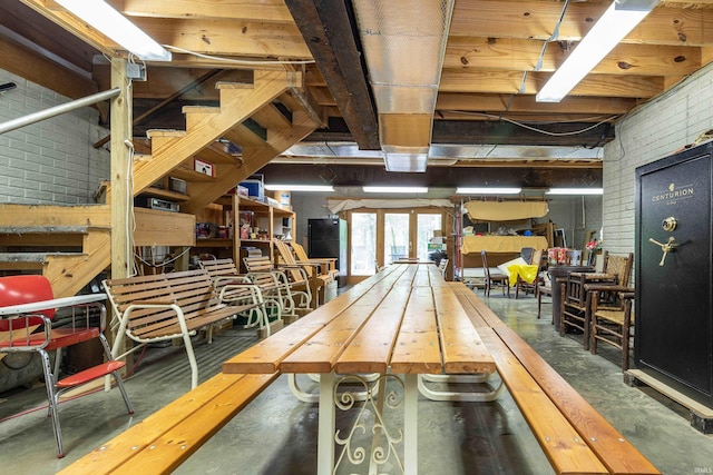 game room with concrete flooring