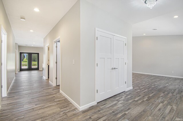 8342 S Sr 17 Hwy, Plymouth, IN 46563 - hallway with french doors, wood finished floors, baseboards, and recessed lighting