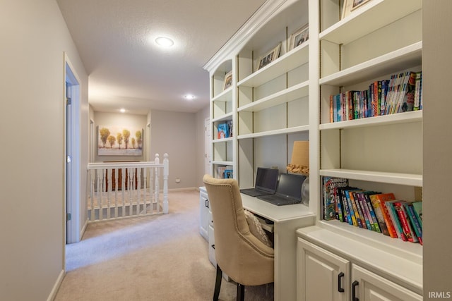 home office with light carpet, recessed lighting, baseboards, and a textured ceiling