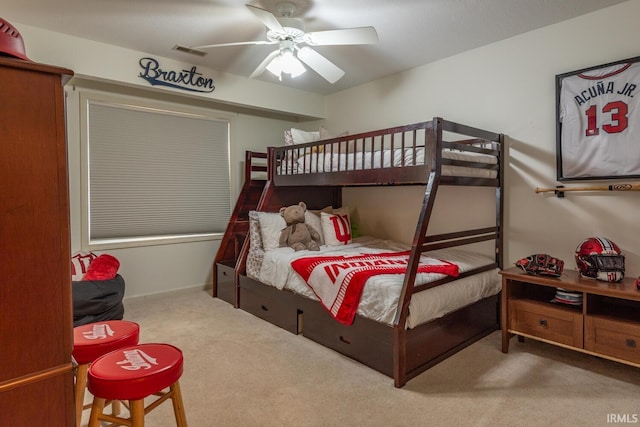 bedroom featuring ceiling fan, carpet, and visible vents