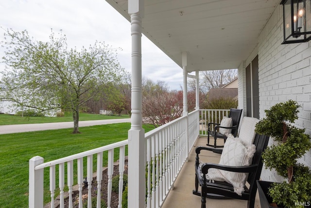 balcony featuring covered porch