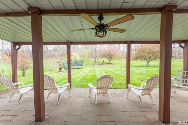 view of patio / terrace with a gazebo, a trampoline, and a ceiling fan