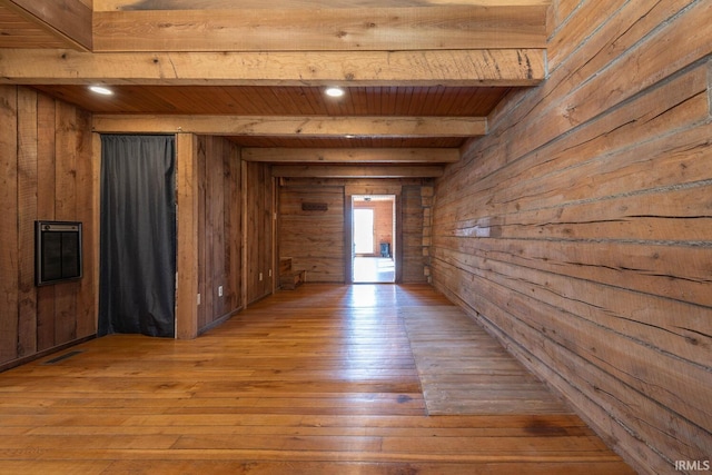 3066 N Pierce Dr, Solsberry, IN 47459 - hall featuring wooden walls, visible vents, beam ceiling, and light wood-style flooring