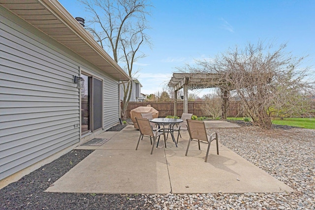 view of patio / terrace with outdoor dining space, a pergola, and a fenced backyard