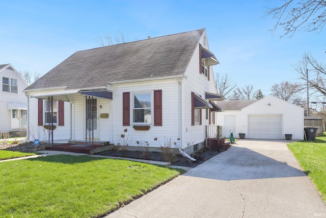 cape cod home with a shingled roof, a garage, an outdoor structure, a front lawn, and driveway