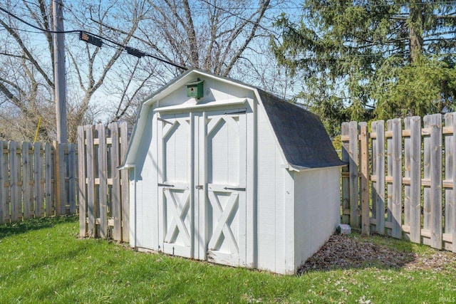 view of shed featuring a fenced backyard