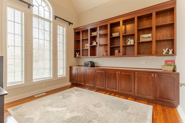 6455 Water Stone Ct, Newburgh, IN 47630 - office featuring light wood finished floors, visible vents, baseboards, and lofted ceiling