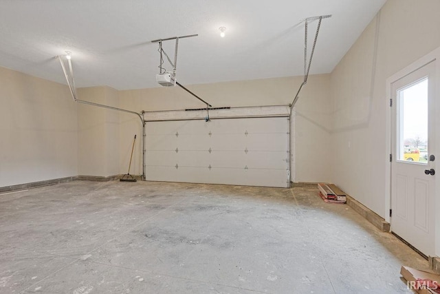 garage featuring a garage door opener