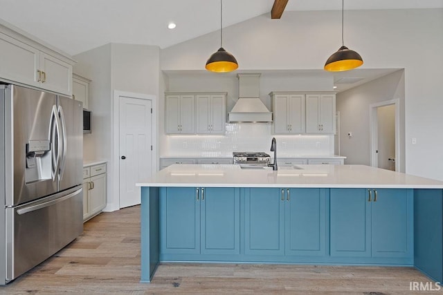 kitchen with custom exhaust hood, lofted ceiling with beams, light countertops, decorative backsplash, and stainless steel appliances