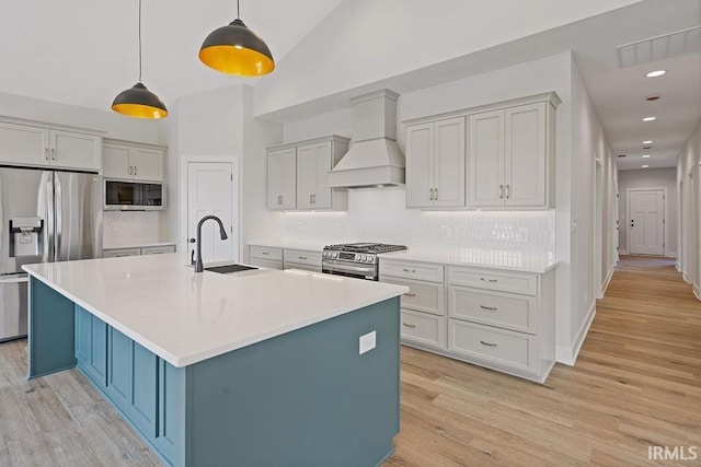 kitchen featuring custom range hood, backsplash, visible vents, and stainless steel appliances